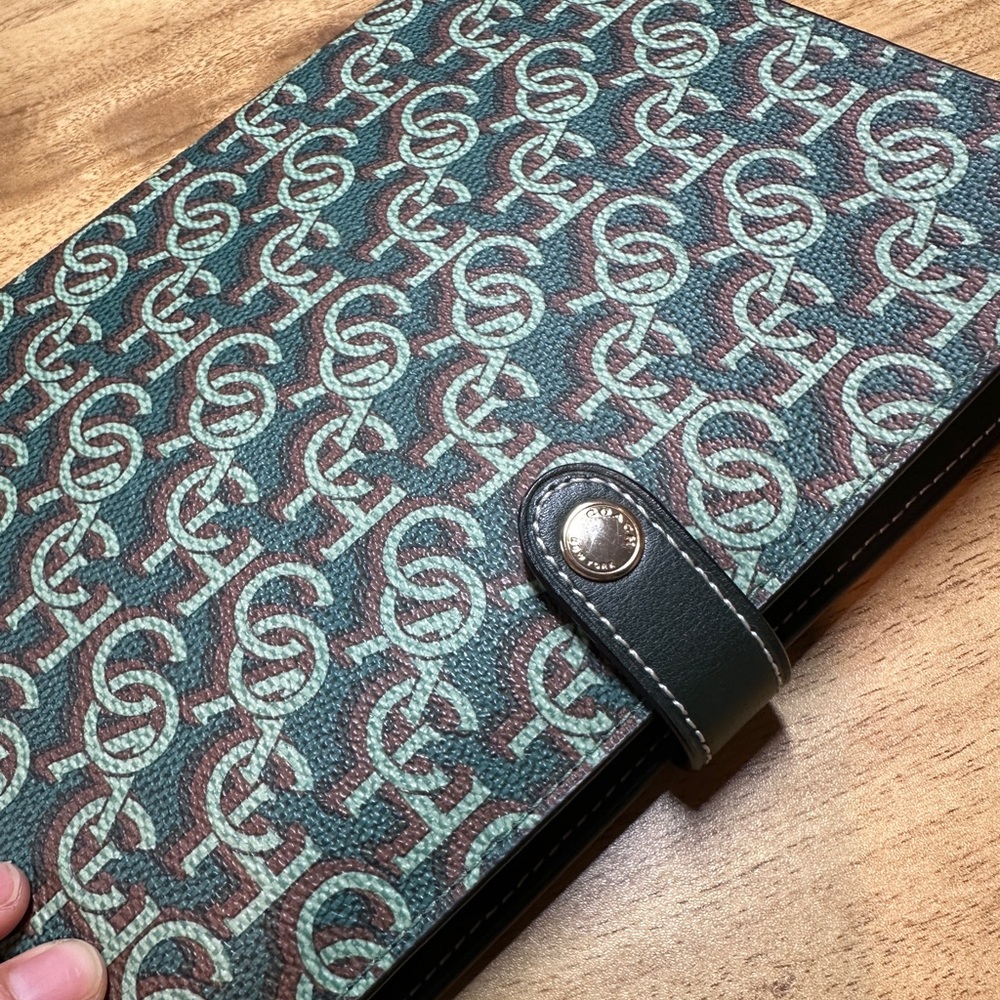 like new coach monogram canvas notebook cover